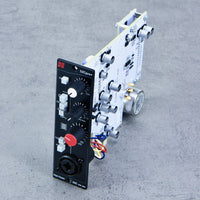 Angled top view of Harrison Audio 32Cpre+ 500 Series Module on concrete surface