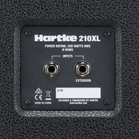 Back panel of a Hartke 210XL speaker with input jacks and branding.