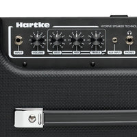 Hartke amplifier head with control knobs and input/output ports on a white background
