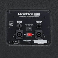 Back panel of a Hartke HD112 speaker with control switches and connectors on a black background.