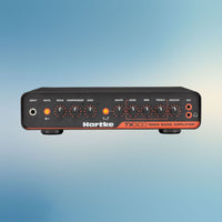 Hartke TX300 bass amplifier on a gradient blue background