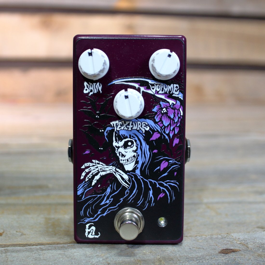 Front view of Haunted Labs Old Ruin Pedal on wooden surface