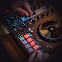 DJ playing the Hercules DJControl Inpulse 300 MK2 DJ Controller inside club