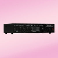 Angled front view of Hiwatt Bulldog 770 Studio Bass Amplifier Head on pink background