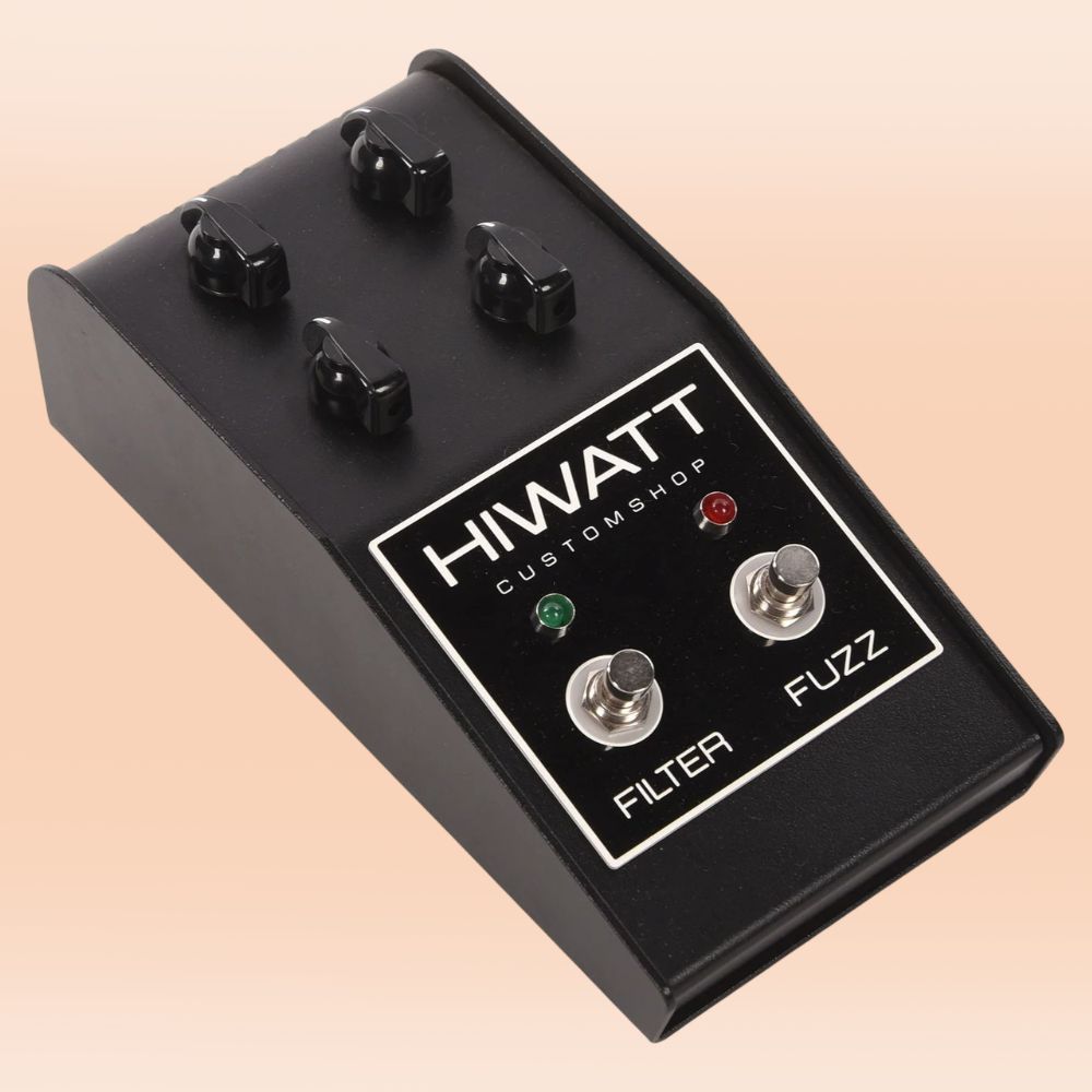 Angled view of Hiwatt Custom Filter Fuzz Pedal on orange background