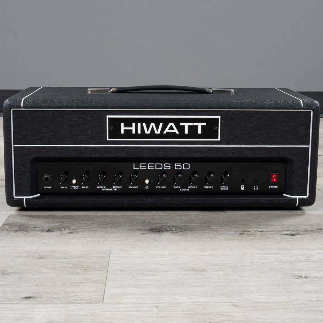 Front view of Hiwatt Leeds 50R Guitar Amplifier Head on wooden surface with grey background