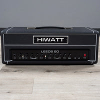 Front view of Hiwatt Leeds 50R Head on wooden surface with grey background