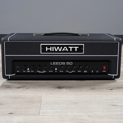 Front view of Hiwatt Leeds 50R Head on wooden surface with grey background