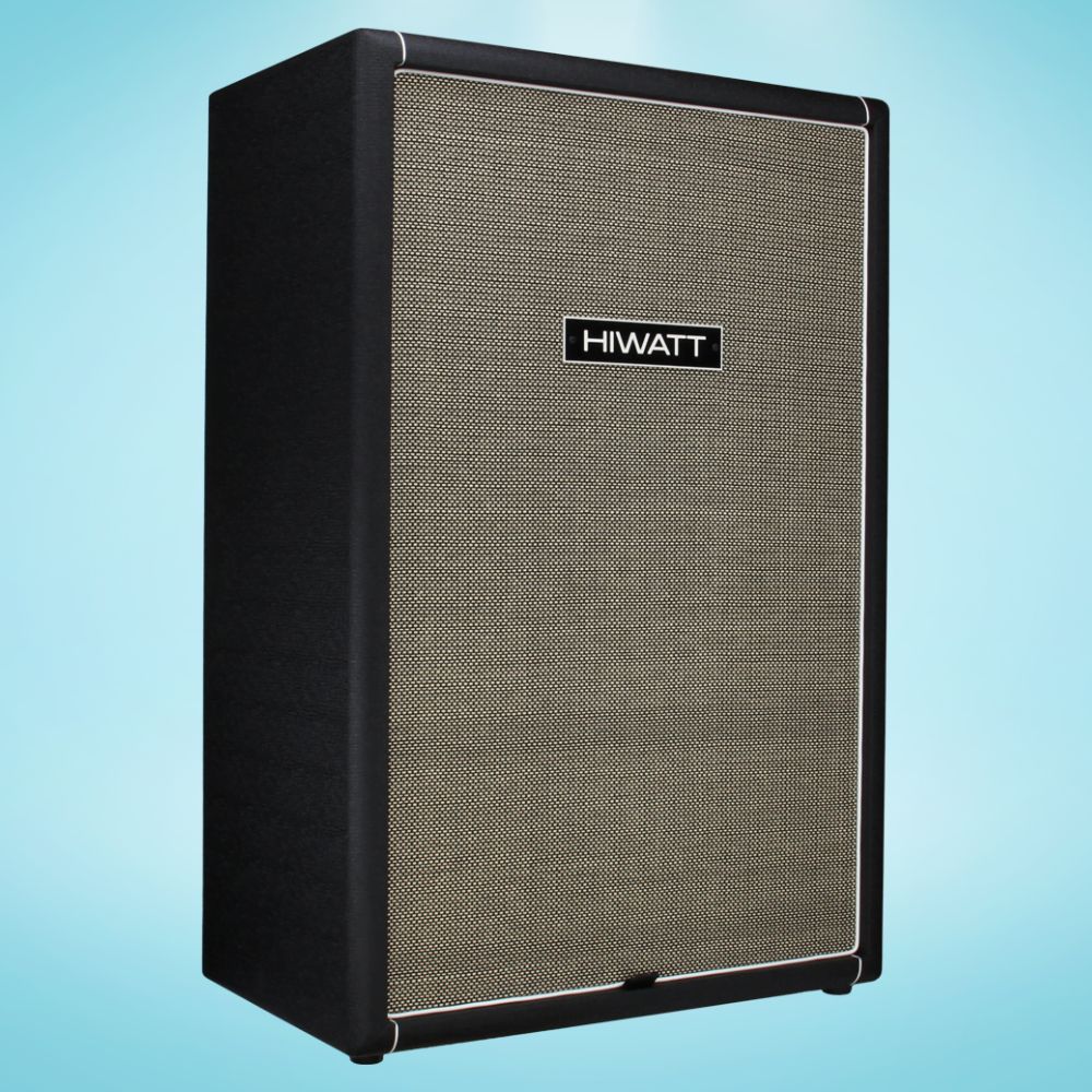Angled view of Hiwatt SE115410F Custom Handwired Bass Speaker Cabinet on blue background