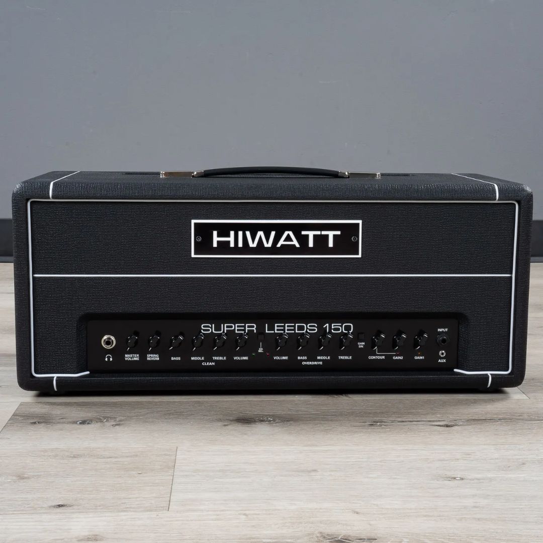 Front view of Hiwatt Super Leeds 150R Guitar Amplifier Head on wooden surface with grey background