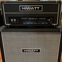 Close up front view of Hiwatt T40/20 Guitar Amplifier Head on top of speaker cab in studio
