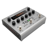 Angled front view of IK Multimedia TONEX Pedal Bass Edition on white background
