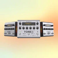 Three IK Multimedia TONEX Pedal Bass Edition products beside one another displaying its top and side angles on yellow and orange gradient background