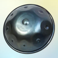 Front view of Isthmus Instruments E SaByeD Handpan on blue and yellow gradient background