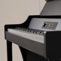 Close up view of the side of Korg G1 Air Digital Piano Black in studio