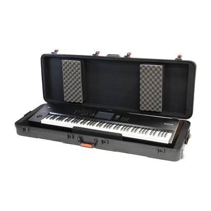 Open lid view of Korg HC-88 with keyboard in case on white background