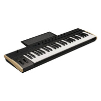 Angled view of Korg Keystage Poly AT MIDI Keyboard 49 Keys with Music Stand leaned back on white background
