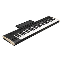 Angled view of Korg Keystage Poly AT MIDI Keyboard 61 Keys with Music Stand leaned back on white background