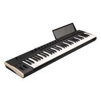 Angled view of Korg Keystage Poly AT MIDI Keyboard 61 Keys with Music Stand up on white background
