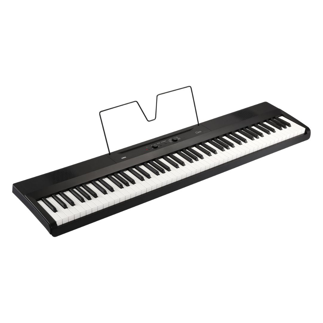 Angled view of Korg Liano with music stand on white background
