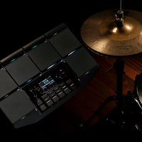 Top view of Korg MPS-10 Drum, Percussion, and Sampler Pad with hi-hat beside it in studio