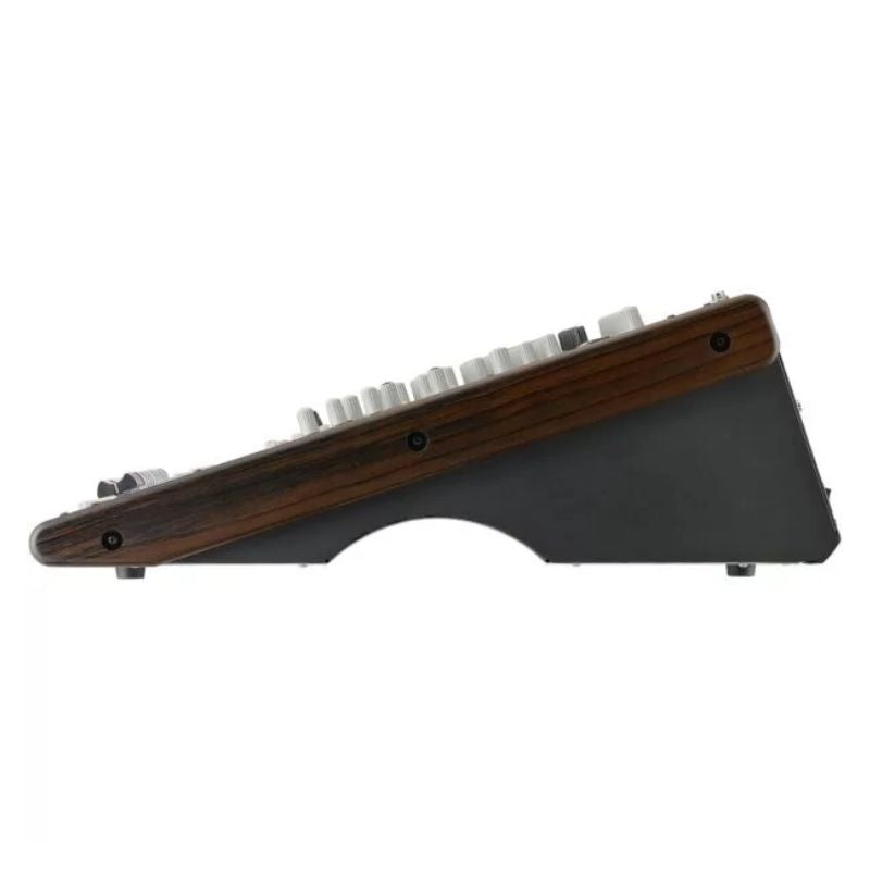 Side view of Korg MW-1608 on white background