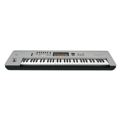 Front view of Korg NAUTILUS AT 61 Keys Gray on white background