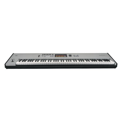 Front view of Korg NAUTILUS AT 88 Keys Gray on white background