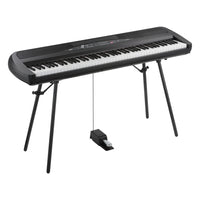 Angled front view of Korg SP-280 Digital Piano on white background