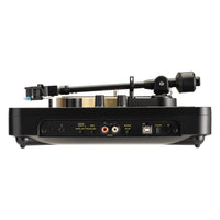 Side view of Korg handytraxx 1bit on white background