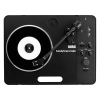 Top view of Korg handytraxx tube with vinyl on white background