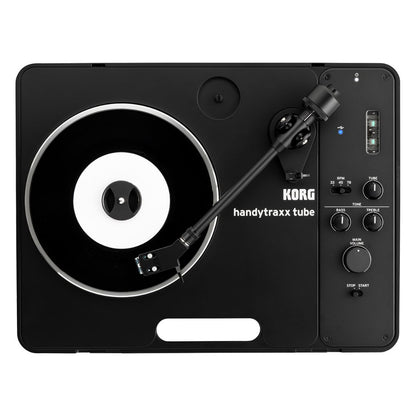 Top view of Korg handytraxx tube with vinyl on white background