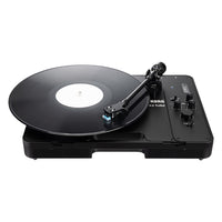 Top view of Korg handytraxx tube with vinyl on white background