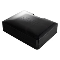 Angled view of Korg handytraxx tube with closed lid on white background