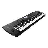Angled view of Korg i3 Super Matte Black on white background