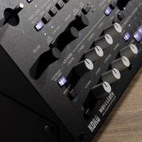 Close up view of Korg wavestate module on wooden surface
