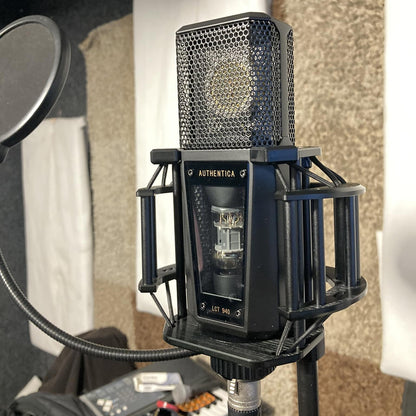 Angled view of Lewitt Audio LCT 940 Tube and FET Microphone mounted on stand in studio