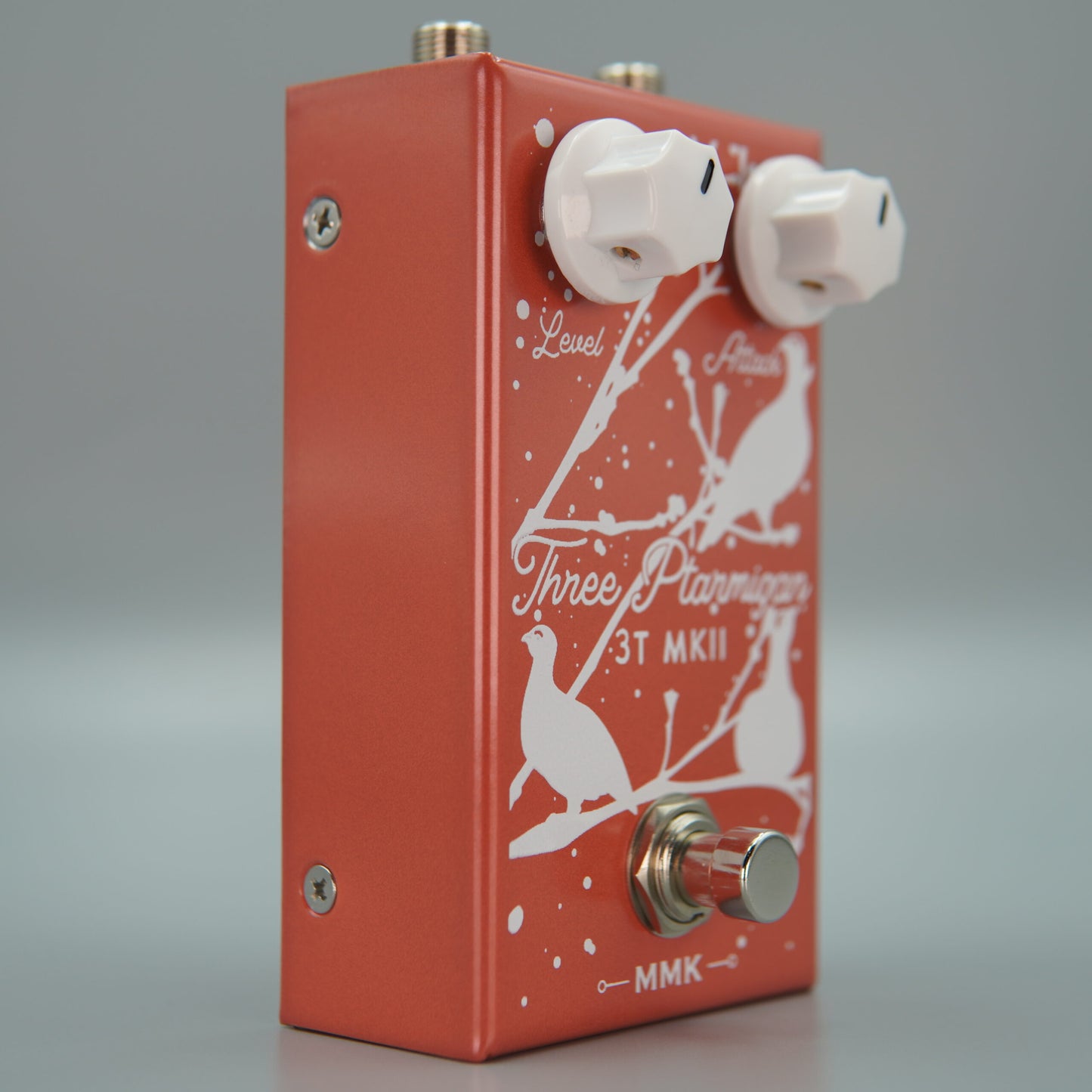 Angled front view of MMK Electrics Three Ptarmigan Pedal on grey background