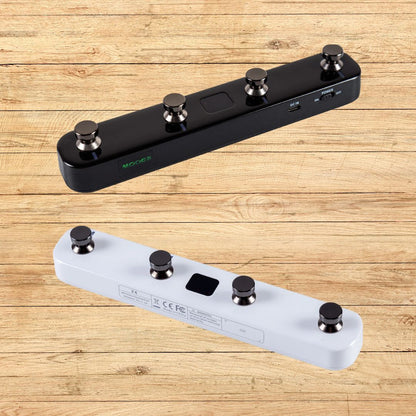 Slanted black Mooer F4 on top of slanted white Mooer F4 with wooden background