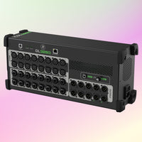 Angled ports view of Mackie DL32SE 32-Channel Wireless Digital Mixer on pink gradient background