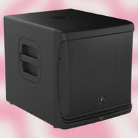 Angled view of Mackie DLM12S 12" 2000W Powered Loudspeaker on pink background