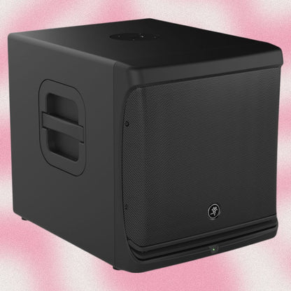Angled view of Mackie DLM12S 12" 2000W Powered Loudspeaker on pink background