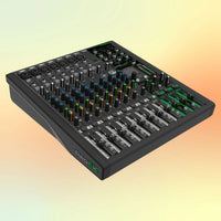Angled view of Mackie ProFX12v3+ 12-Channel Analog Mixer w/ USB Recording & Bluetooth on yellow and orange gradient background