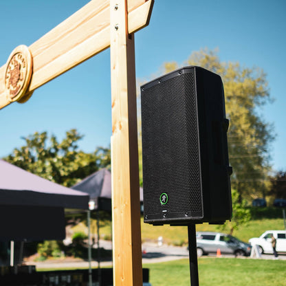 Angled view of mounted Mackie Thrash212 GO 12" 300W Battery-Powered Loudspeaker outdoors