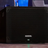 Angled view of Mackie Thump18Sv4 18" Professional Powered Subwoofer on stage