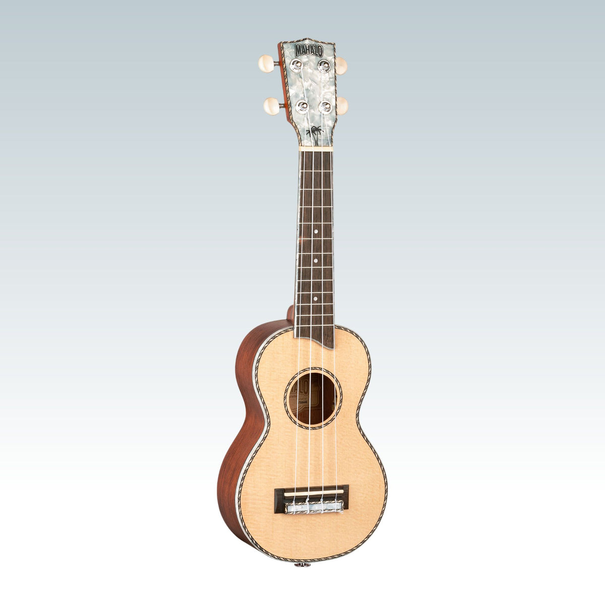 Front view of Mahalo MP1 Pearl Series Soprano Ukulele on smokey background