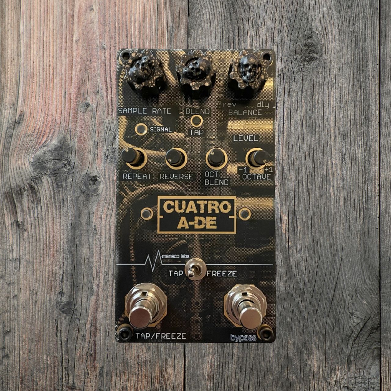 Maneco Labs 4AD Pedal on a Wooden Table