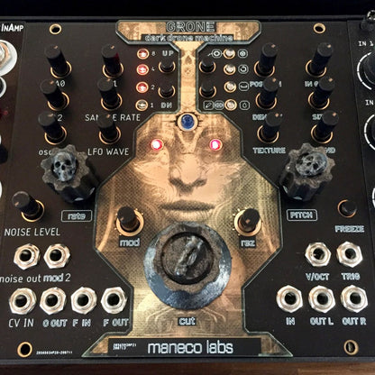 Front view of Maneco Labs Grone Drone Synth Module with other eurorack modules beside it