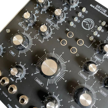 Angled close up view of Maneco Labs Grone Drone Synth Voice Moog 5U Module on white background