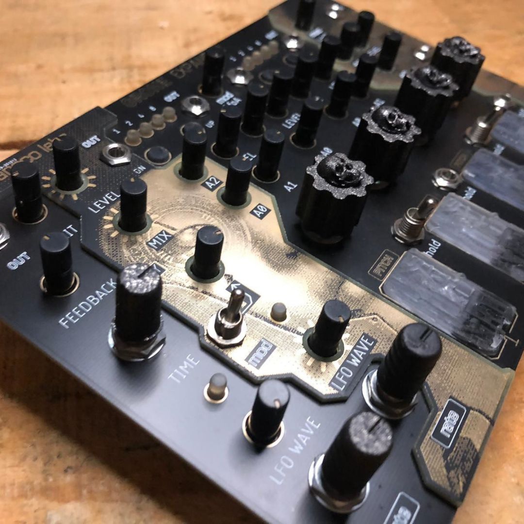 Angled close up view of Maneco Labs Grone Expander Module on wooden surface